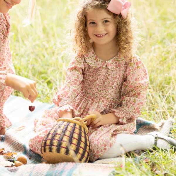 Antoinette Dress with Raspberry Crumble Hand Smocking made with Liberty Poppies & Daisies Fabric